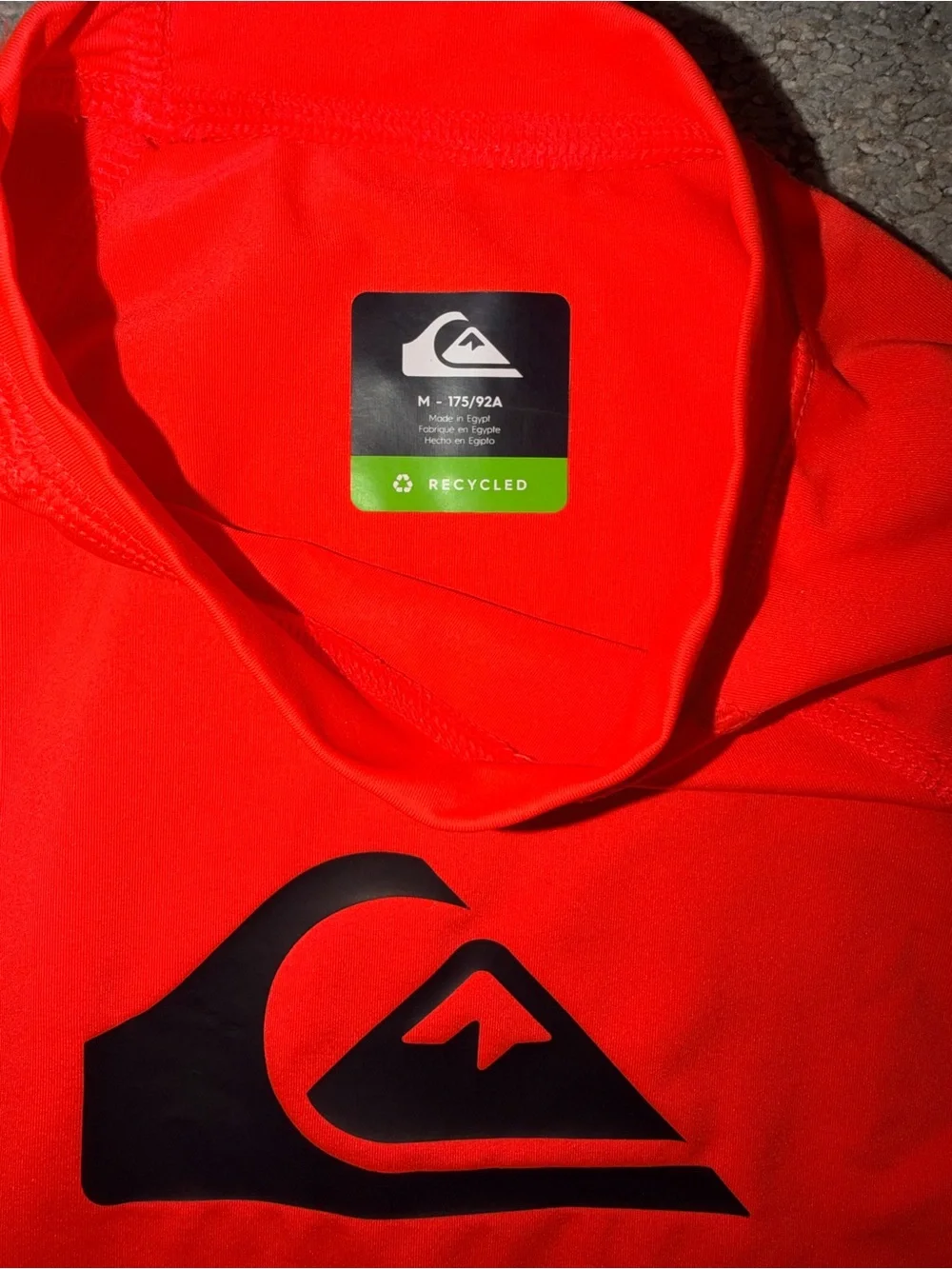 Quiksilver Men’s Neon Orange Short-Sleeve Rash Guard with Black Logo
